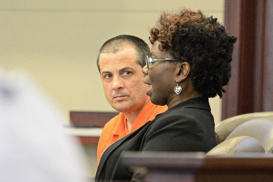 Matthew Nesbitt listens to attorney Regina Nunnally at his sentencing hearing Sept. 14. (Photo by Jonathan Simmons)