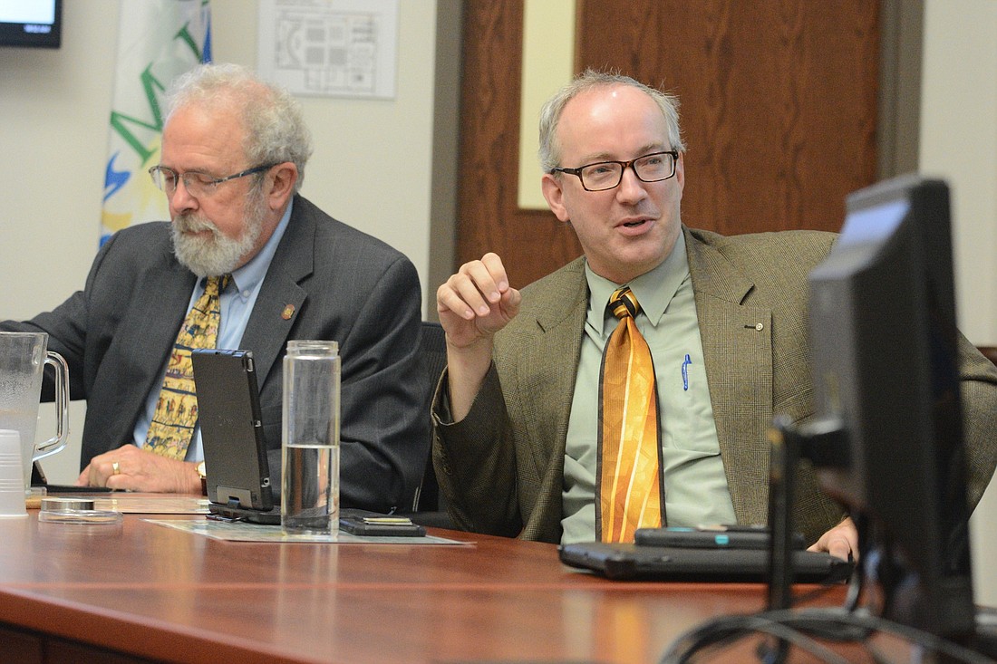 Councilman Vincent Lyon, right, speaks during a council workshop Sept. 25. Councilman Bob Cuff is at left. (Photo by Jonathan Simmons)