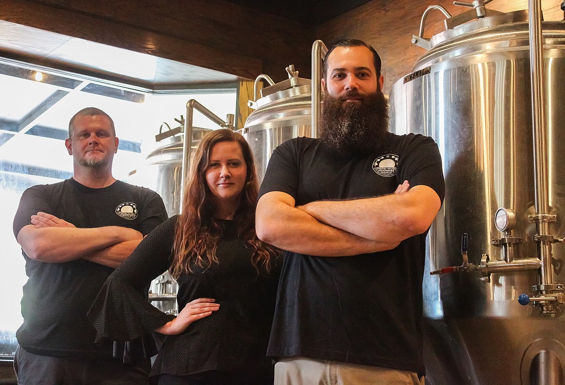 Left to right: Moonrise Brewing Co. owners Vance Tyson Joy (brewer), Ashley Dees and Benjamin Davenport. Photo by Ray Boone