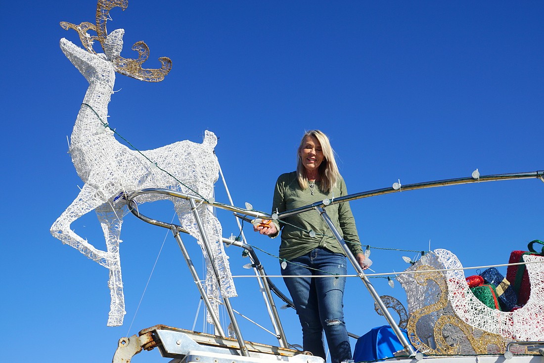 Palm Coast resident Donna Heiss is already decorating her 44-foot Marine Trader Trawler named 'Southerly€ for the 36th-annaul Palm Coast Holiday Boat Parade. Courtesy photo
