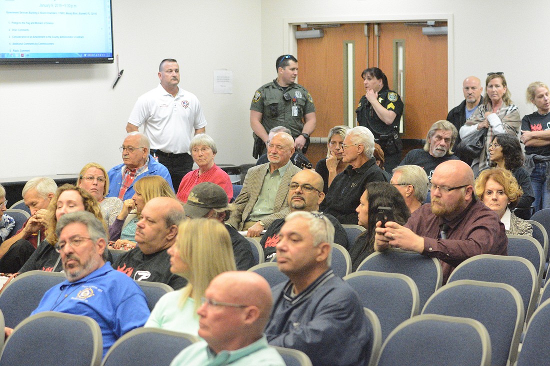 A crowd of about 80 people attended the meeting. (Photo by Jonathan Simmons)