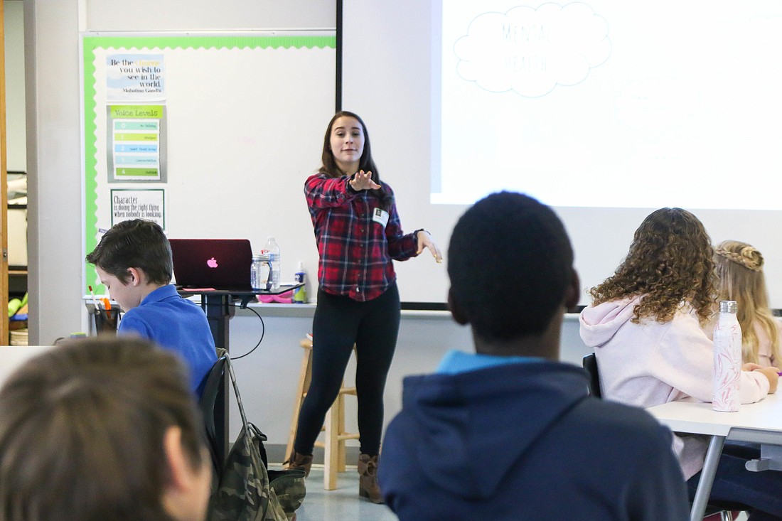 Flagler Palm Coast High School senior Valerie Diaz calls on a Bunnell Elementary sixth-grader during her "Thinking Out Loud" presentation. Photo by Paige Wilson