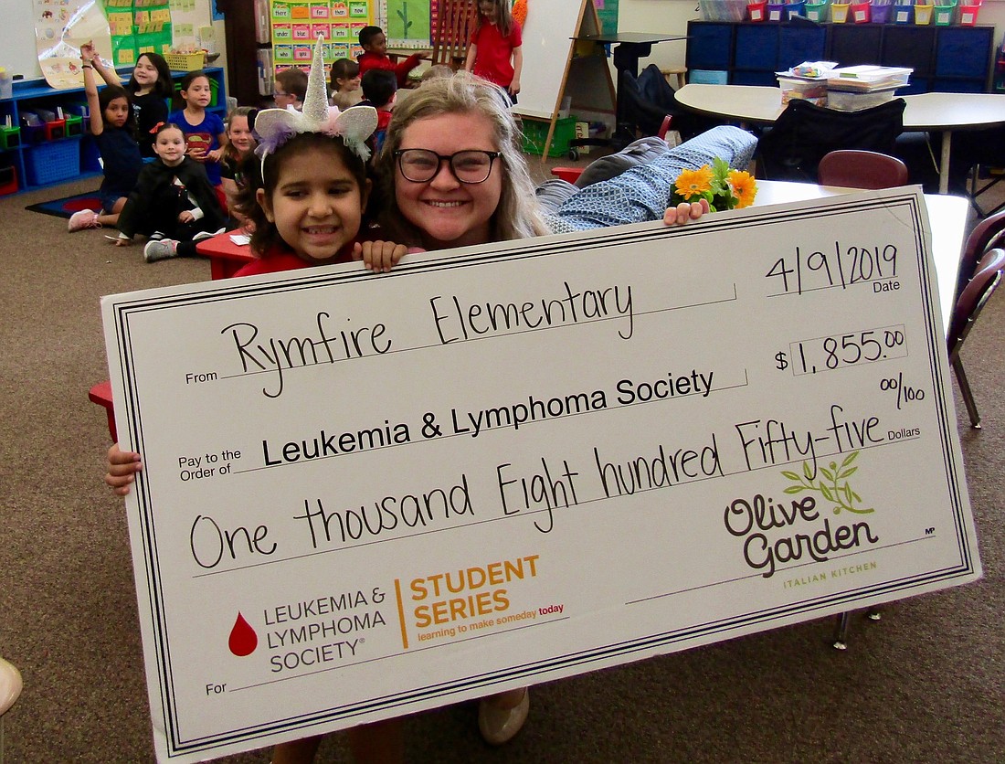 North and Central Florida Chapter of The Leukemia and Lymphoma Society representative Megan Then and first-grader Sophia Costa. Photo courtesy of Melanie Tahan