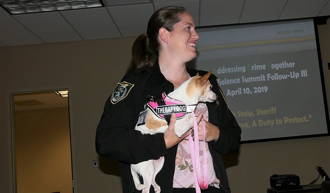 Detective Fiona Ebrill and her dog Khaleesi, who was recently certified as a therapy dog. Photo courtesy of the Flagler County Sheriff's Office