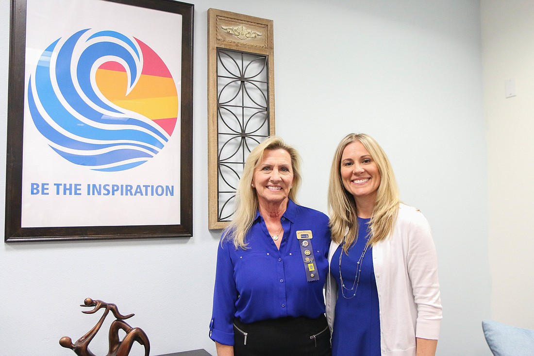 Rotary Club of Flagler County President Cindy Kiel Evans and Project WARM Director of Operations Nicole Lucente in the newly redecorated space. Photo by Paige Wilson