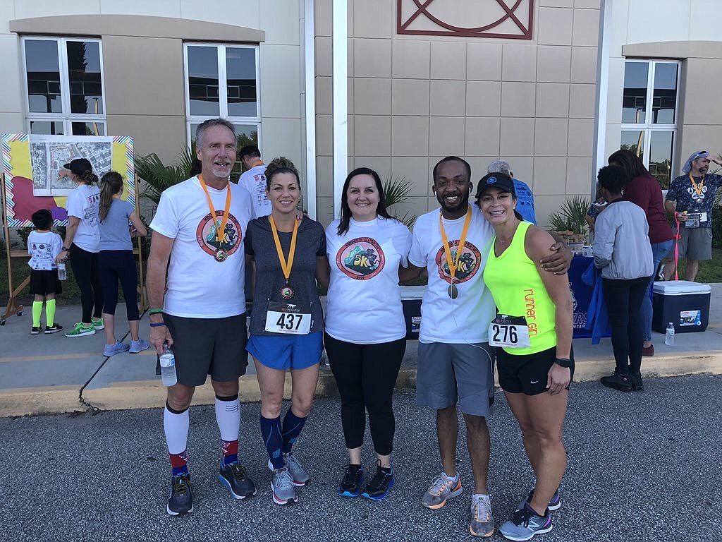 Superintendent James Tager, his wife Jodi Tager, Sara Casale, DeAndre Harris and Wadsworth Elementary School Principal Anna Crawford at the WES 5K. Courtesy photo