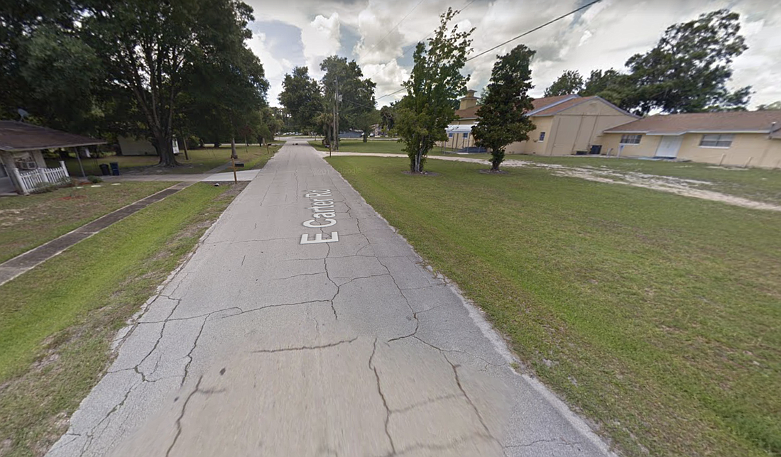 Officers found the knife in the ditch along East Carter Road. (Photo from Google Maps)