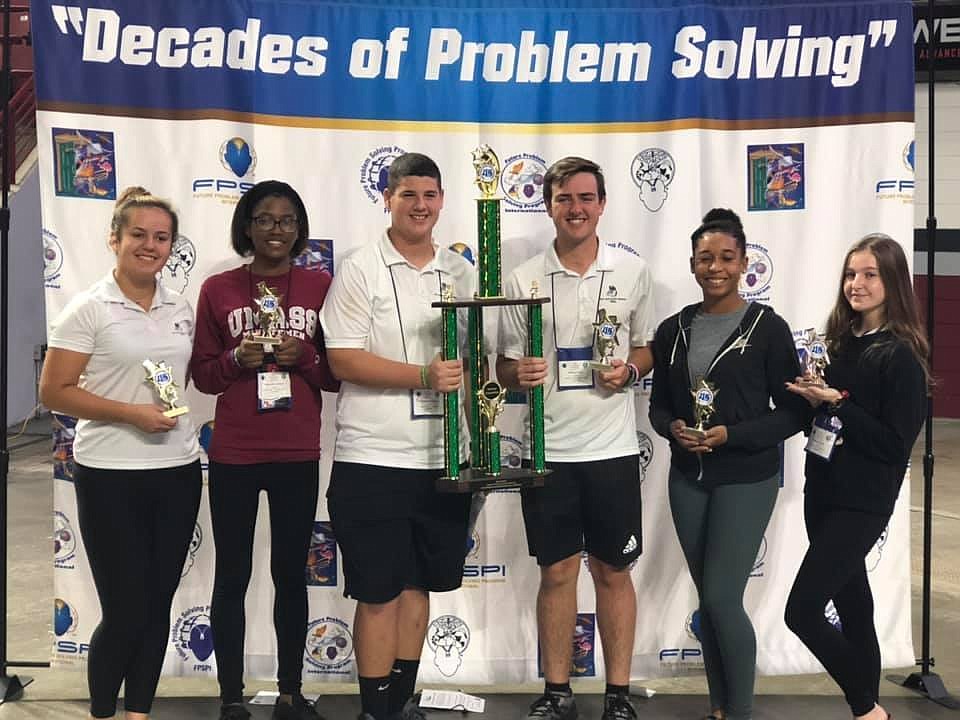 FPC Bulldog Patrol members Katia Martynuk, Gabby Jackson, Nick Blumengarten, Will Patin, Sydni Leon and Abbigail Carver with their Grand Champions award at the International Conference. Photo courtesy of Flagler FPS