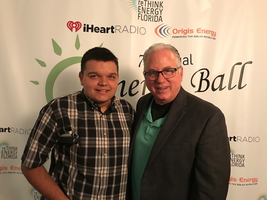 WNZF's Trent Ferguson and friend Paul Rogers, president of Northwest Florida's iHeartRadio stations. Courtesy photo