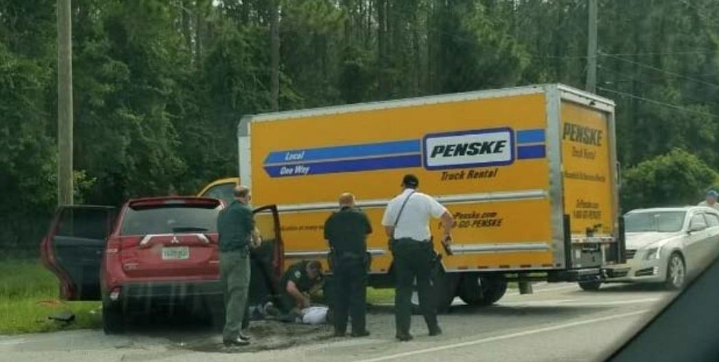 Suspects being placed under arrest following crash. Photo courtesy of the FCSO
