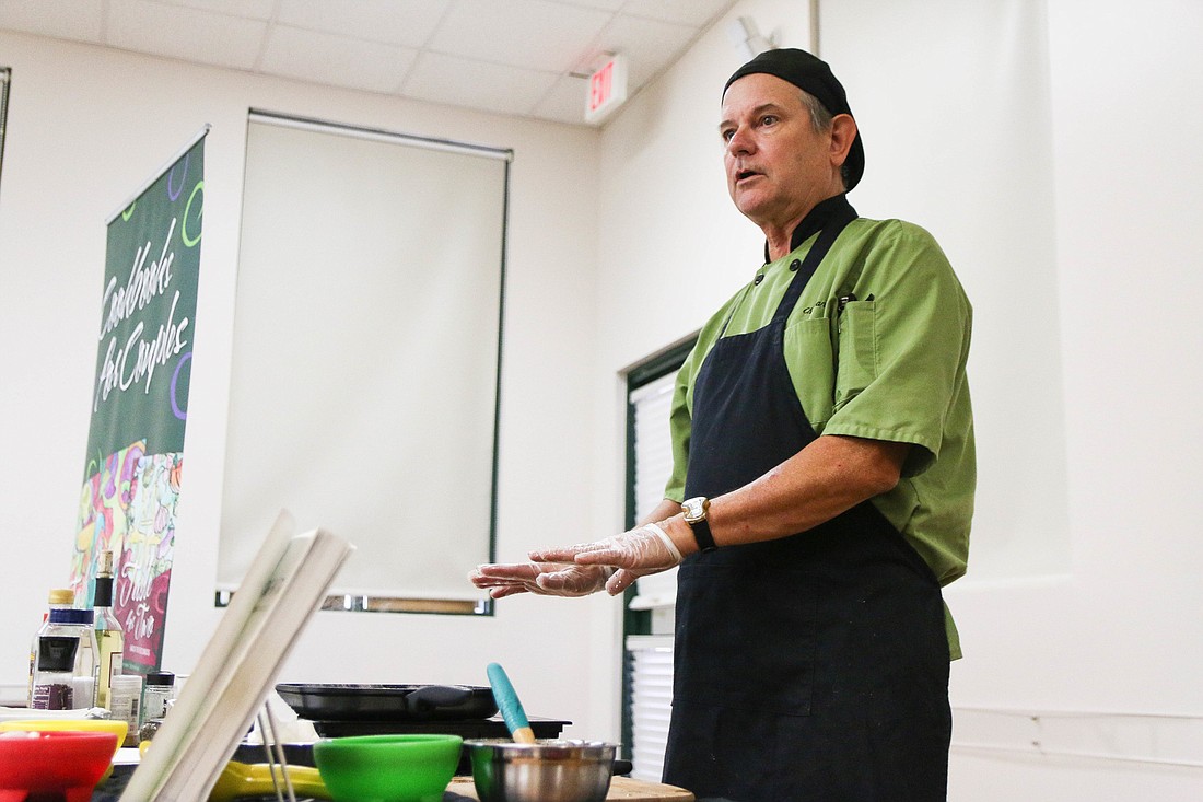 Chef Warren Caterson teaches a cooking class called "The Thrill of the Grill." Photo by Paige Wilson
