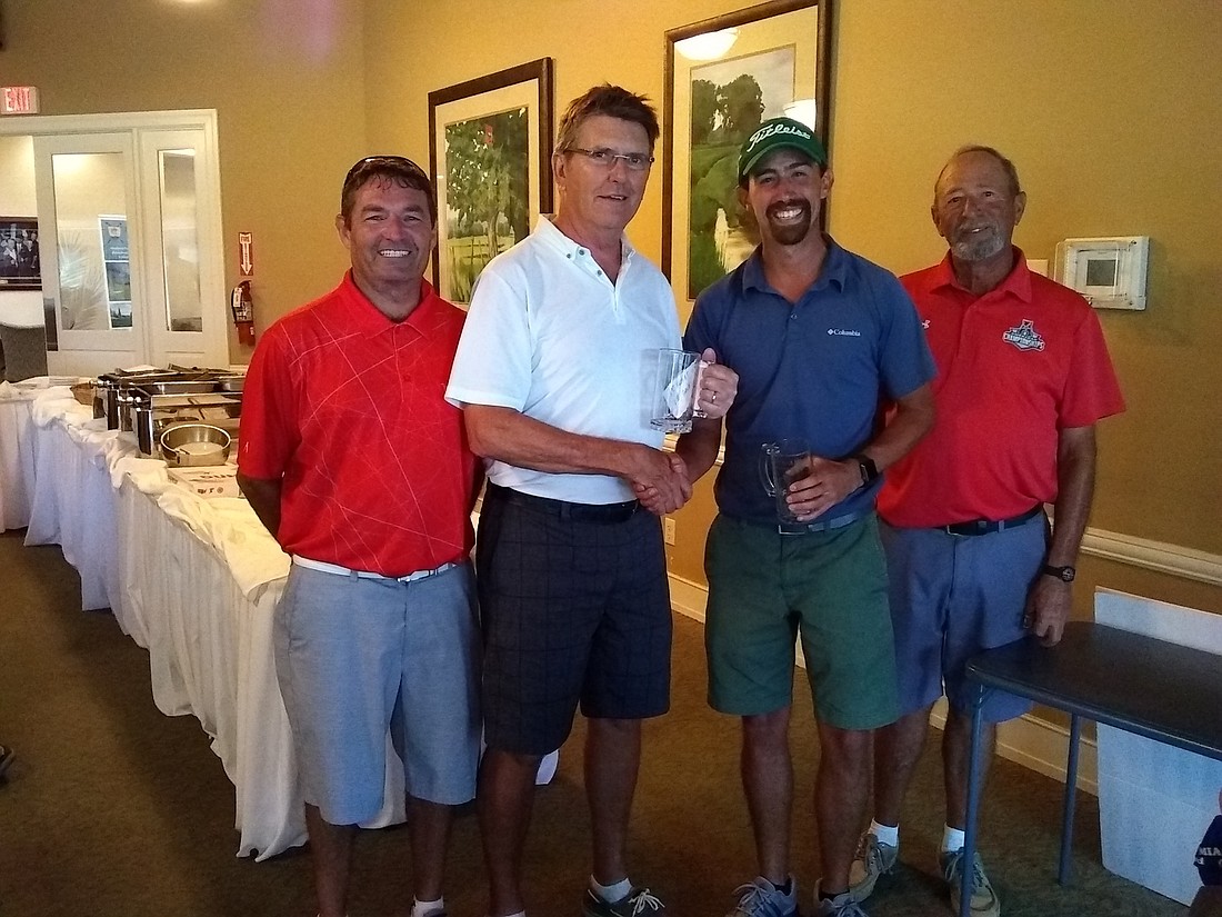 Brave Aid golf tournament event organizer Anthony Labrano, first flight winners Rory Burke and Bryce Goulding and tournament director Tom DeMarco. Courtesy photo