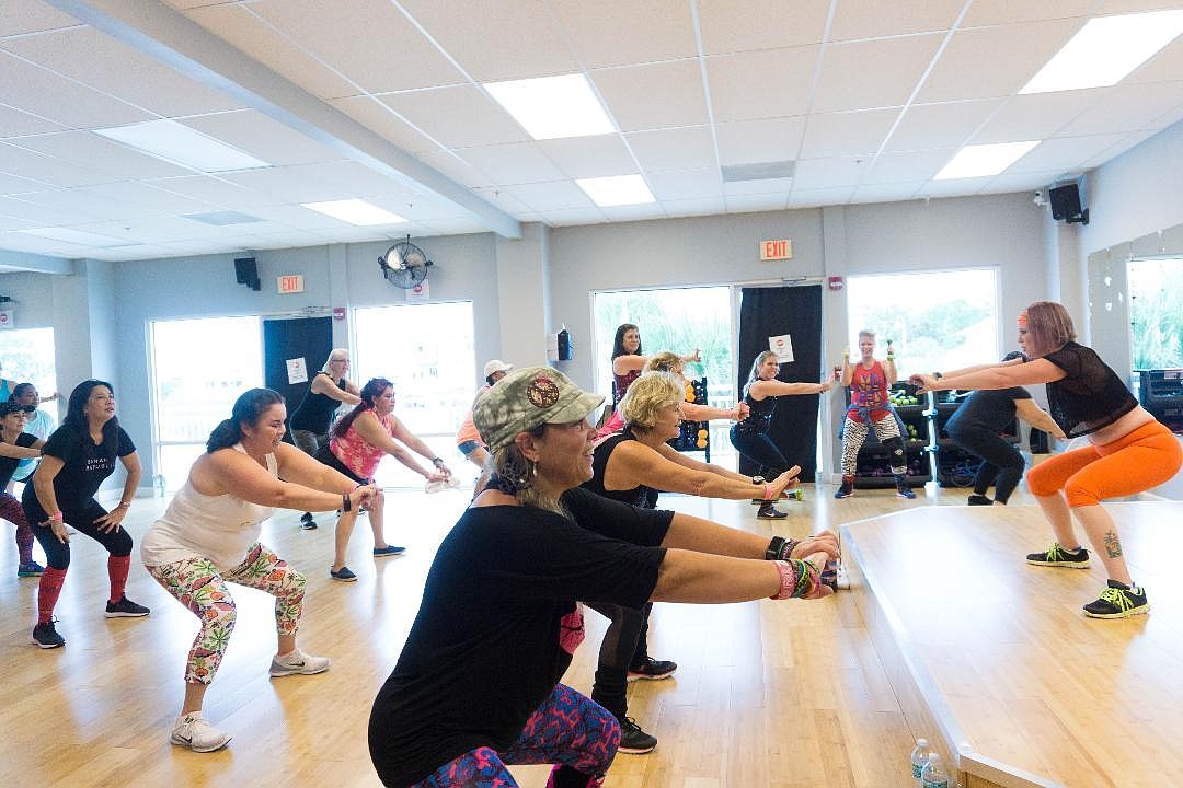 Zumba Instructor Melissa Eugley leading a routine. Photo by Sarah Clarke Photography