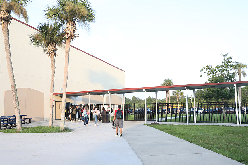 Students enter Buddy Taylor Middle School. File photo by Paola Rodriguez