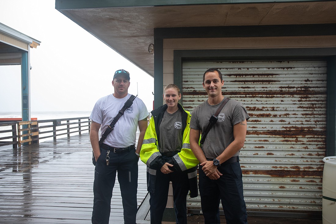 Flagler Beach Fire Department Capt. Stephen CoxÂ , firefighter Kayla Mullen and Lt. Anthony Forte. Â Photo by Paola Rodriguez