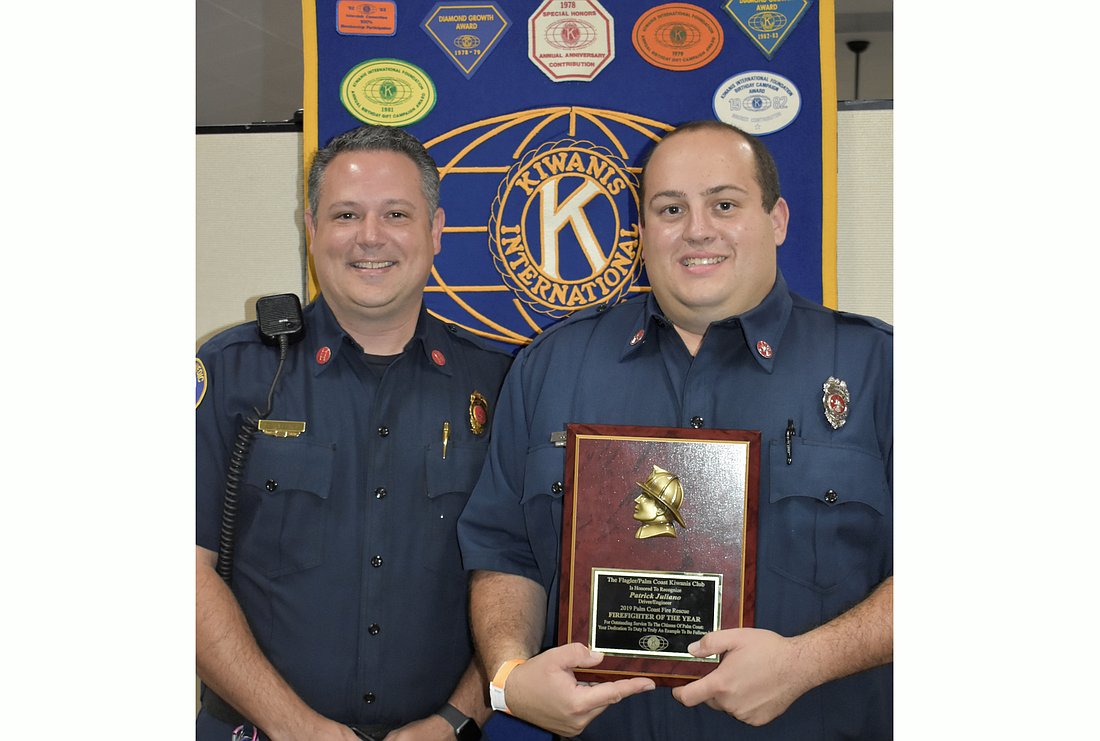 Patrick Juliano, right, is the Flagler-Palm Coast Kiwanis Club's 2019 Firefighter of the Year. Capt. Thomas Ascone, left, nominated Juliano. (Courtesy photo)