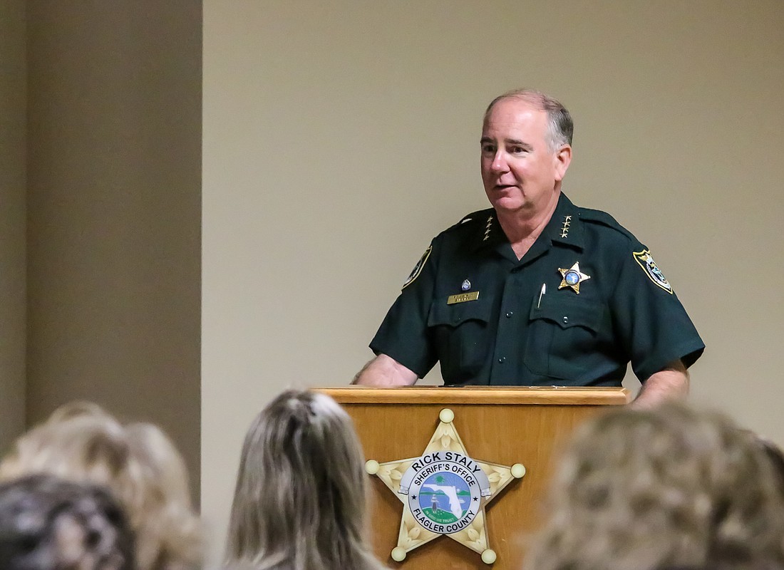 Flagler Sheriff Rick Staly speaks at the domestic violence summit. Photo by Ray Boone