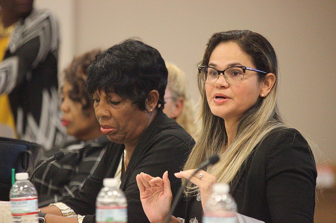 Paola Roman, vice president of Housing Development at Carrfour Supportive Housing, speaks at an Oct. 29 community forum on affordable housing. Photo by Jonathan Simmons