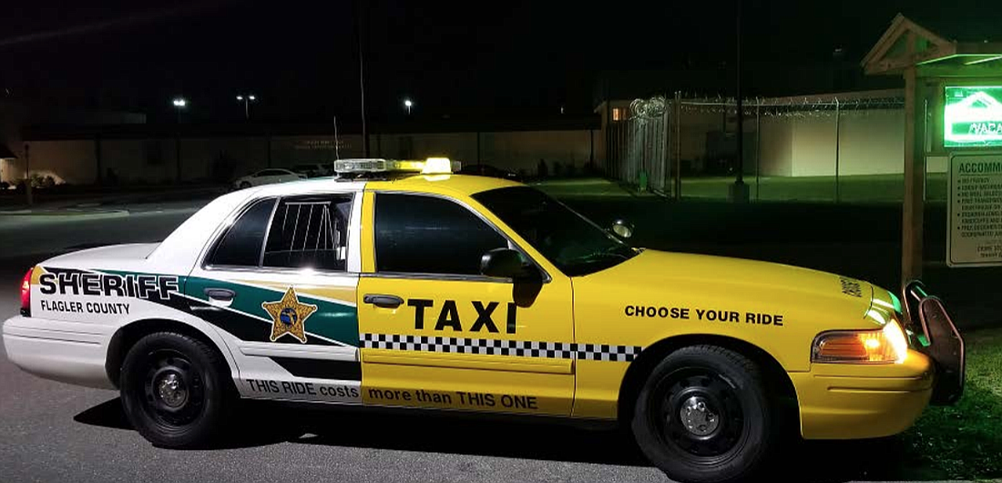 FCSO Sheriff-Taxi Patrol Car at the Flagler County Jail. Courtesy of the FCSO