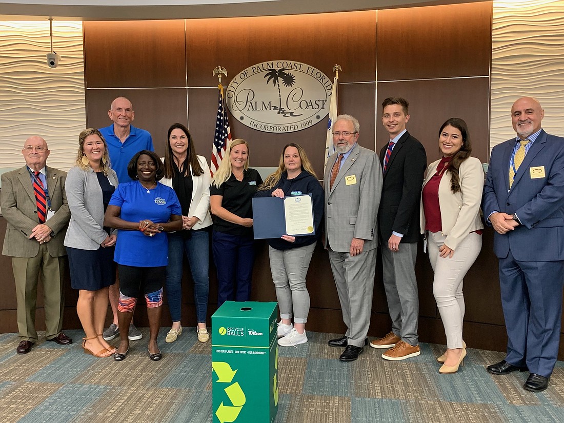 Palm Coast City Council members, Parks & Recreation Director Lauren Johnston, Environmental Planning Technician Jordan Myers, Friends of Tennis and representatives from Waste Pro. Courtesy of the city of Palm Coast
