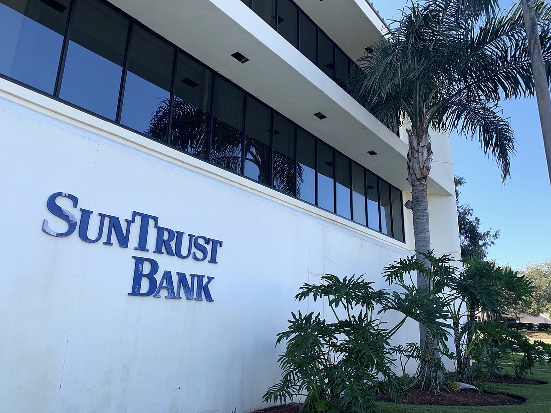 SunTrust is moving to Island Walk's entrance. Photo by Brian McMillan
