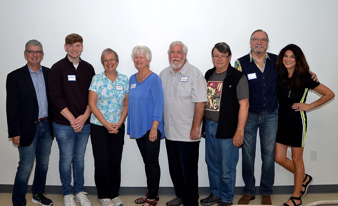 Photography show winners: Scott Spradley, Steven DiMaria, Lucie LaChance, Donna Callmeyer, Joe Campanellie, Terry Bottom, Larry Mingledorff and Lisa Fisher. Courtesy of FCAL