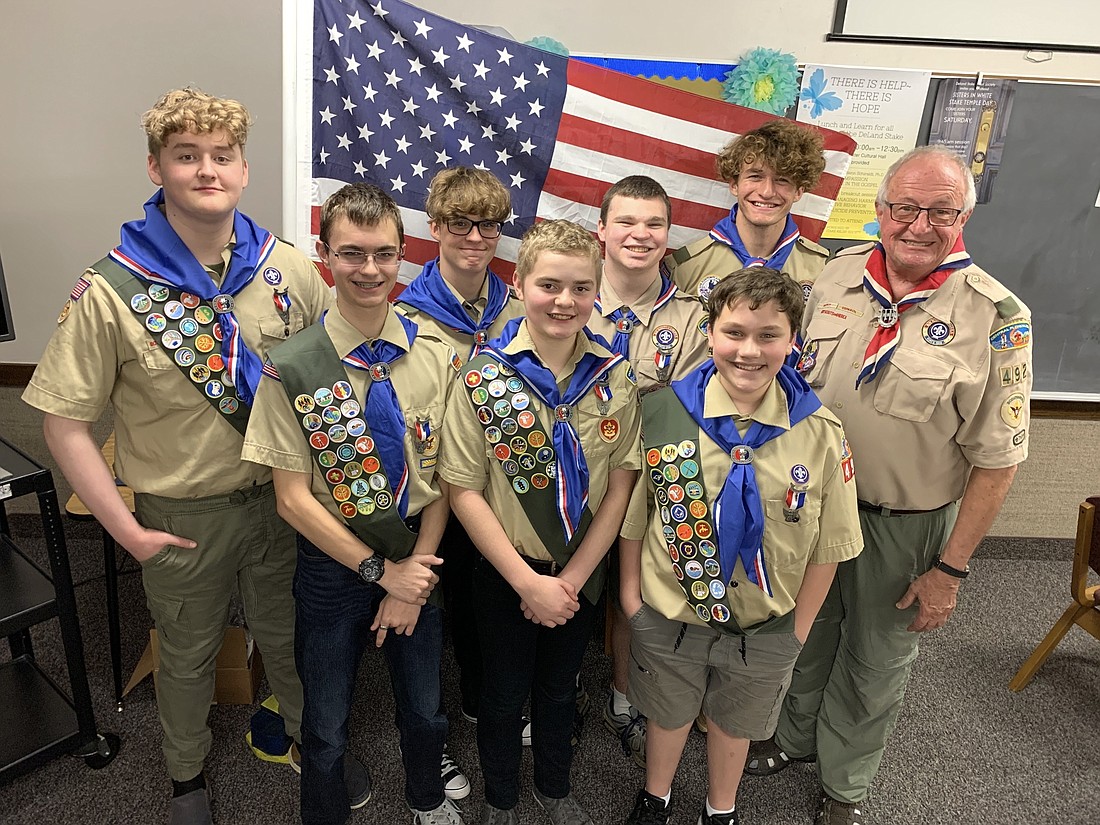 Seven Eagle Scouts in one year: Dallen Hoffmann, Jackson McMillan, Joseph Hoffmann, Anderson Hoffmann, Logan Raymond, Grant McMillan, David Wilcox ' and their scoutmaster, Roger Thompson. Photo by Brian McMillan