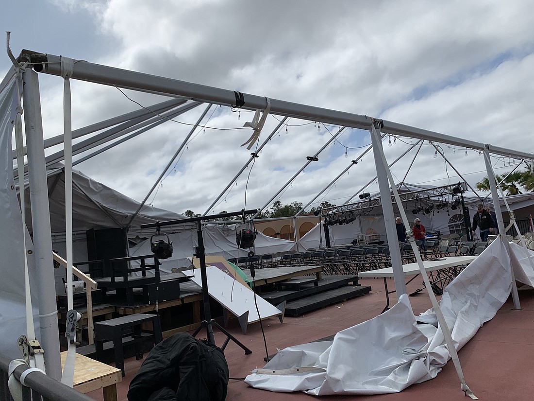 The Palm Coast Arts Foundation's tent was ruined by high winds Feb. 22. Photo by Angela Young