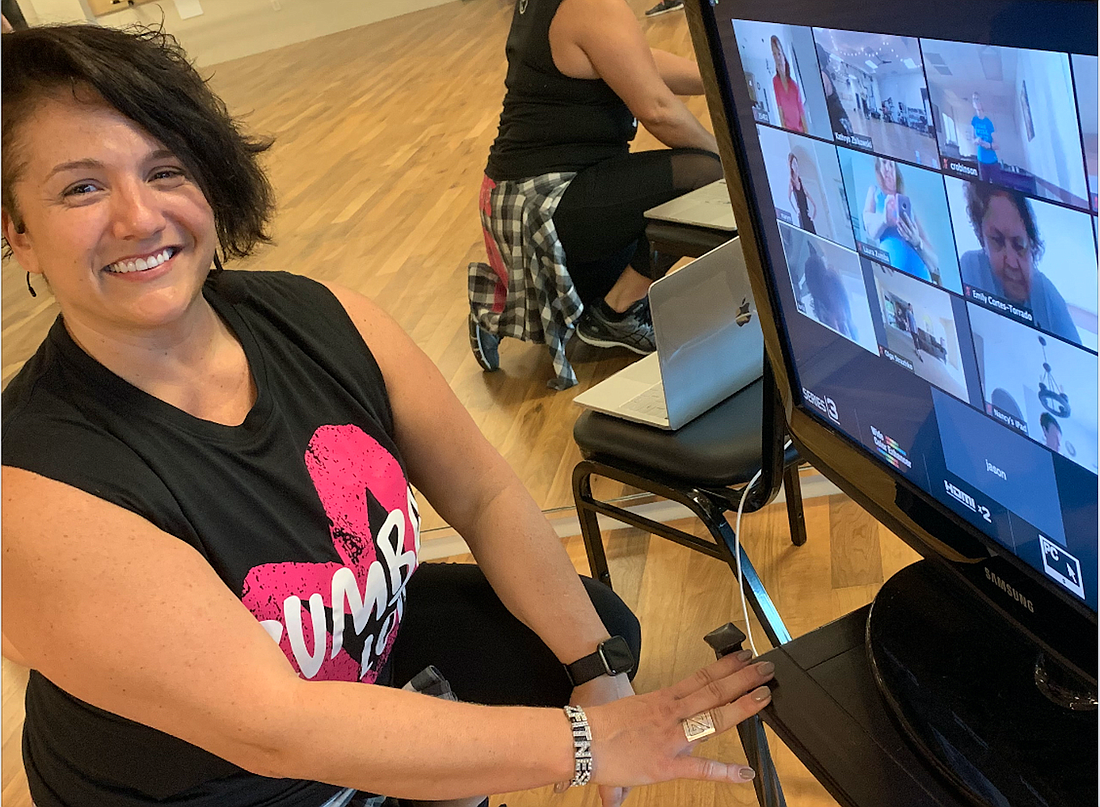 Kathryn â€œCoach Z' Zbikowski leads workout sessions remotely. She got the idea to adapt to at-home workouts about a month ago; she figured that if other countries were shutting down, we would, too.