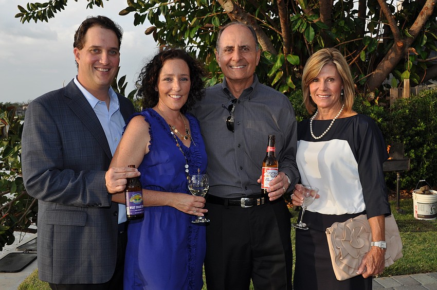 John and Suzanne Anderson with John and Denise Saputo