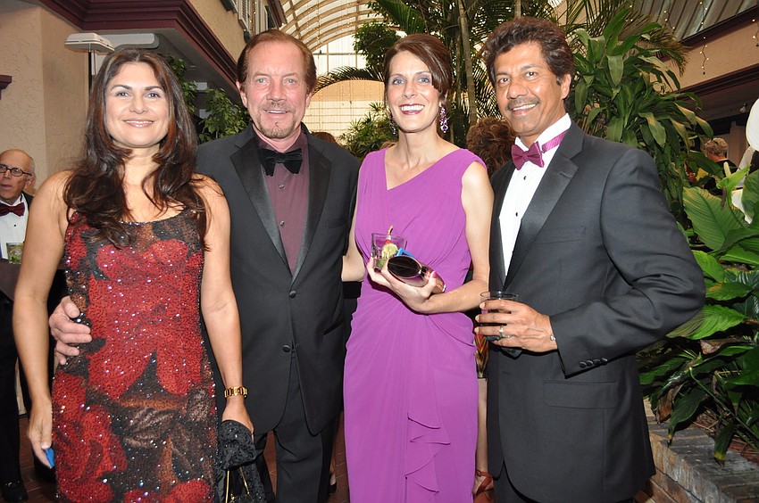 Martha Bandinel and Tom Hubbner with Melanie and Sean Natarajan