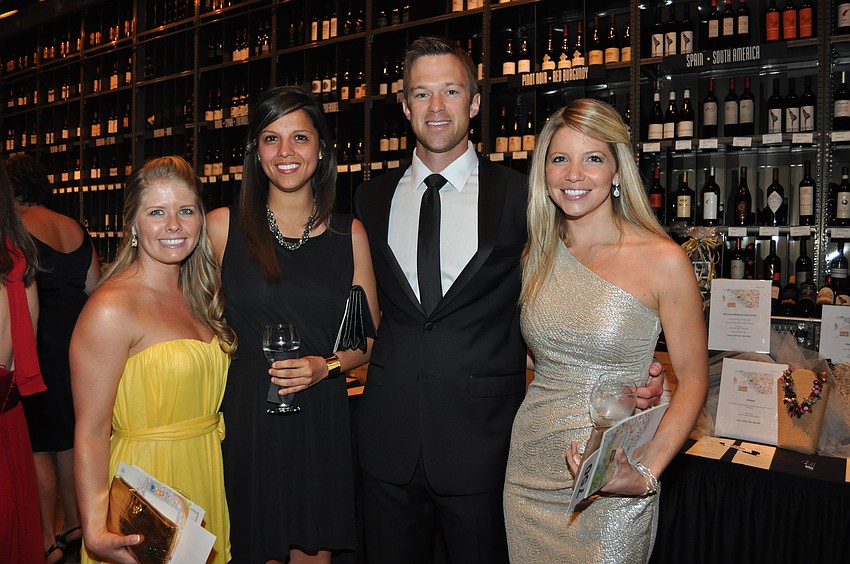 Katie Biter and Nadia Pachon with Alex and Jovanna Morgan