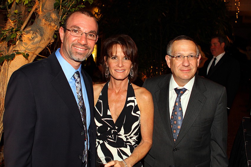 Matt and Jessica Blano with Rabbi Joel Mishkin