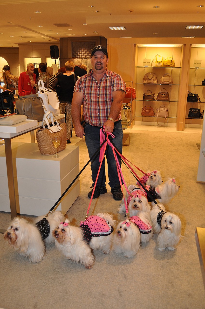 Dan Blazowich brought his entourage of pups to Saks.