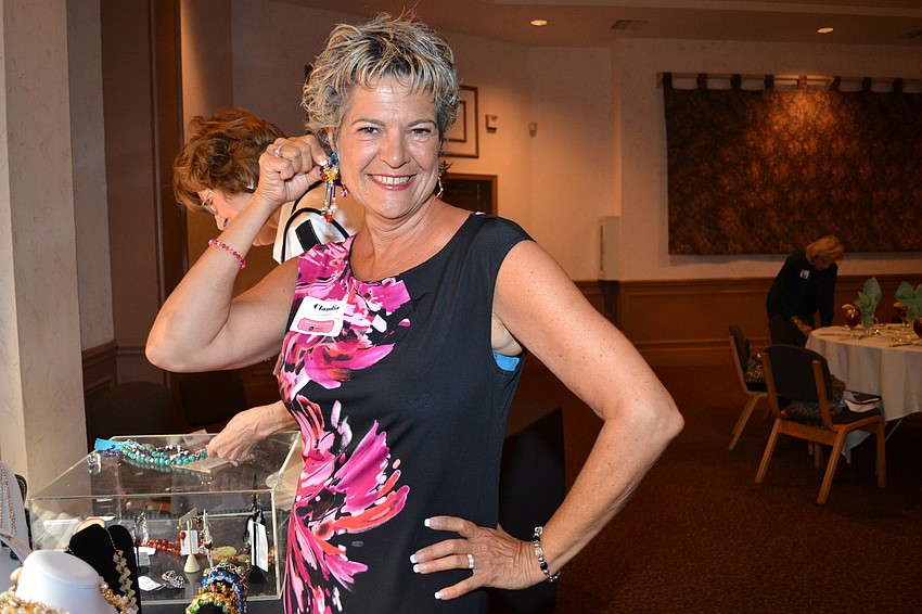 Claudia Cardillo shops for earrings.