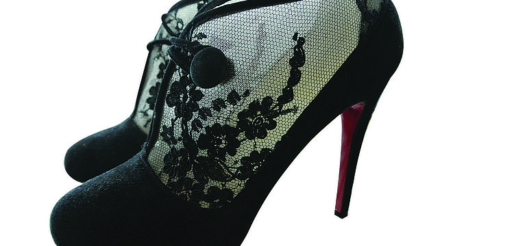 CHRISTIAN LOUBOUTIN CLIC CLAC LACE BOOTIE
<br><br>
â€œI thought they were stunning with the lace-and-button detail and the signature Louboutin bottom.â€