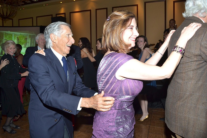 Guests gathered on the dance floor and formed a conga line.