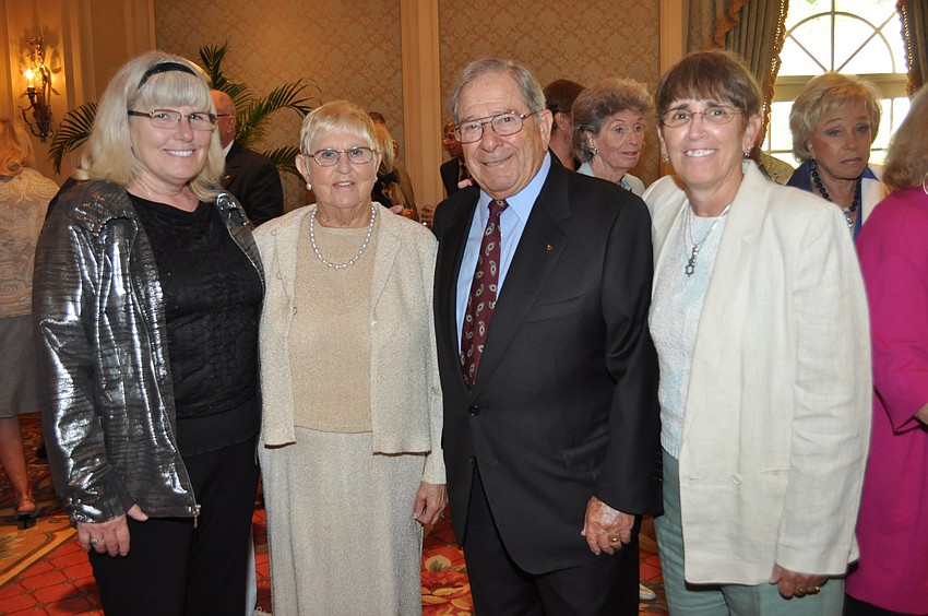 Claudia Coville with honorees Margot and Warren Coville and Betsy Coville