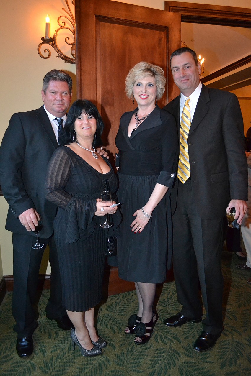 Dan and Stacey 
DeLoynes with Ruth and Glen Everhart