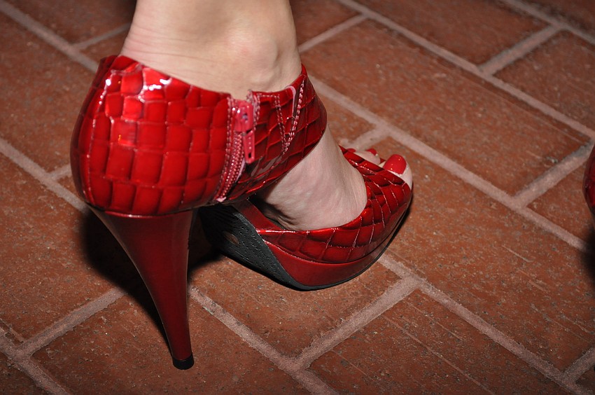 Diana Napollielo wore red stilettos to the event.