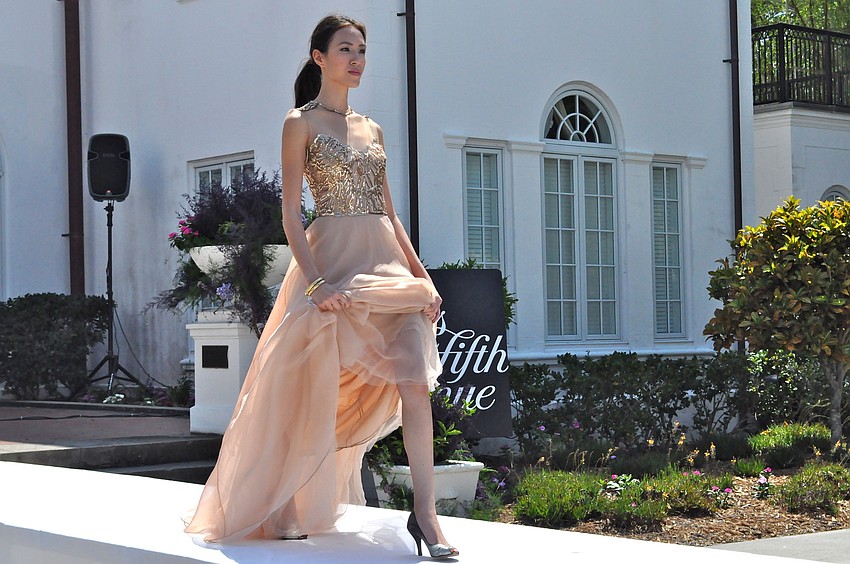 Models strutted the runway in Saks Fifth Avenue fashions.