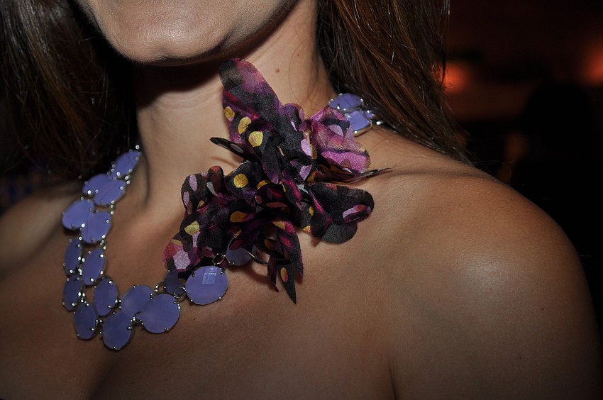 Jennie Famiglio took pieces of material that her children accidentally pulled off of her dress and added them to her necklace.