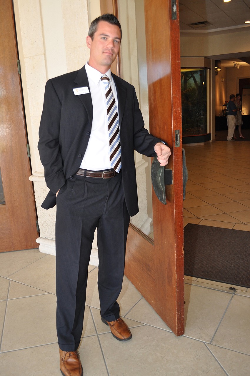 Tony Gabriel was one of the official greeters for women attending the luncheon.