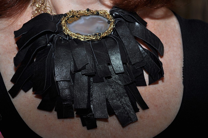 Karen Grierson shows off her jewelry.