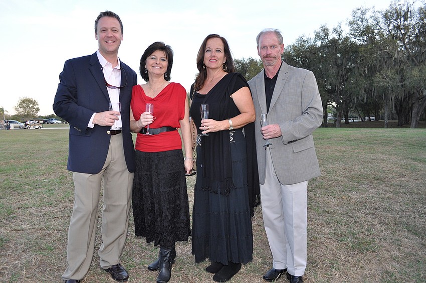 Barry Grooms and Sherry Richardson with Lois and Jeff Prater