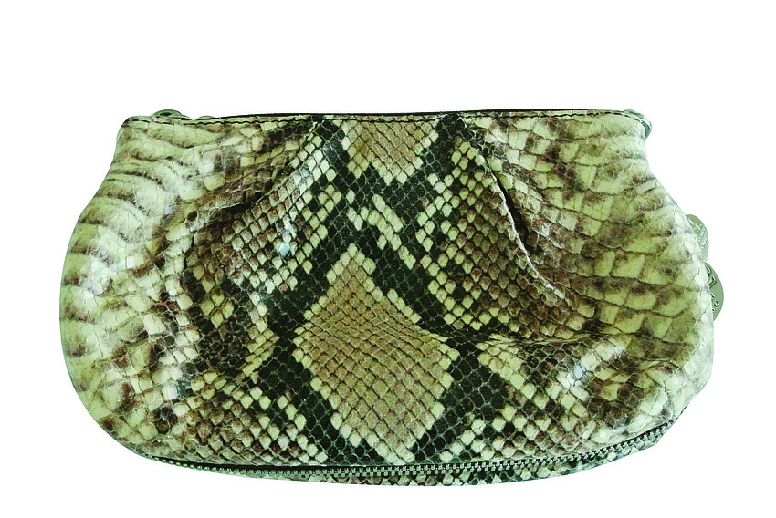 HENRI BENDEL PYTHON CLUTCH
<br><br>
â€œThis is a python clutch from Henri Bendel in New York City. Itâ€™s a great going out bag and matches my Jimmy Choo stilettos.â€