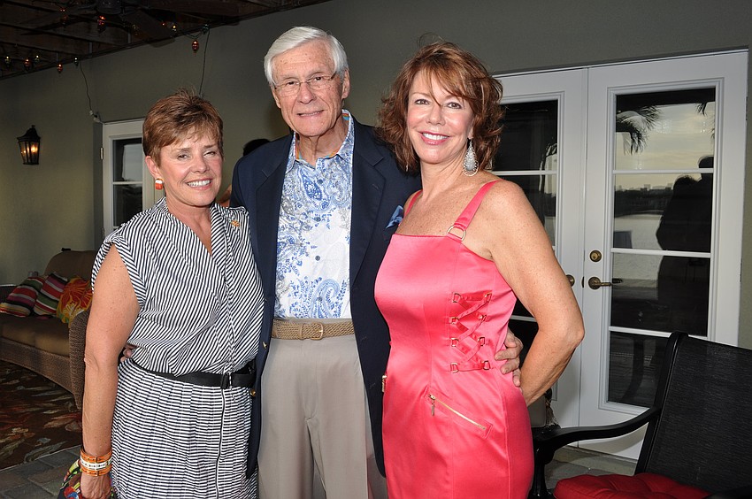 Mary Kay and Joe Henson with host Donna Simmons