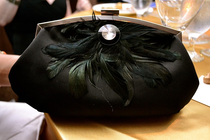 Monica Slater Van Buskirk carried this Jessica McClintock clutch.