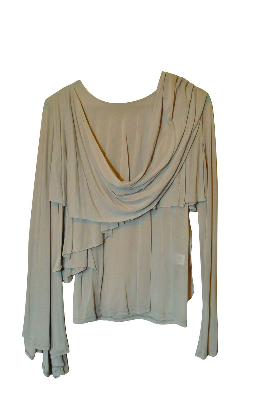 JUNO AND JOVE BLOUSE
<br><br>
â€œIt has this amazing faux scarf wrap and always looks elegant, yet hip. Plus, itâ€™s good for the environment.â€