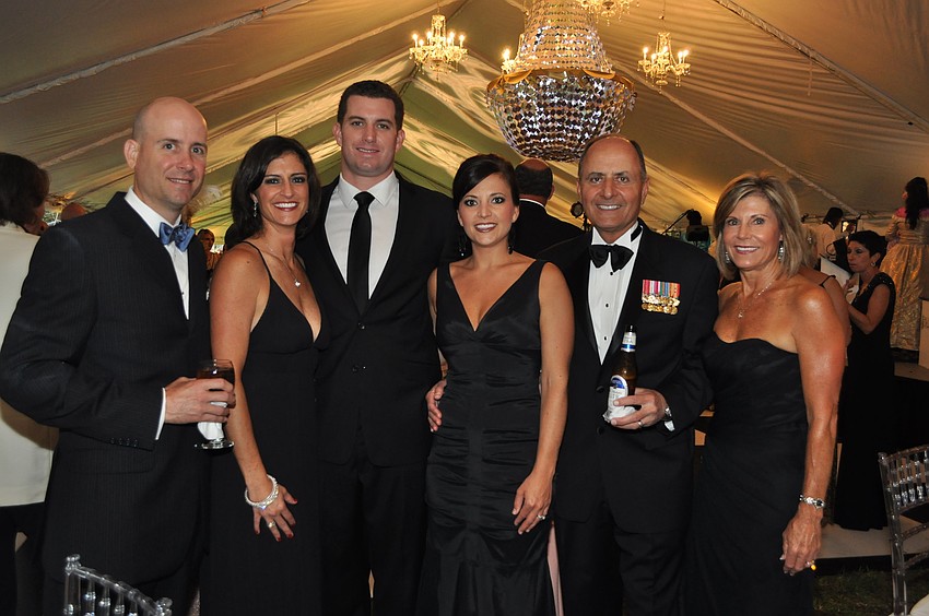 Michael and Sarah Mackie, Devyn and Bethany Dugger and John and Denise Saputo